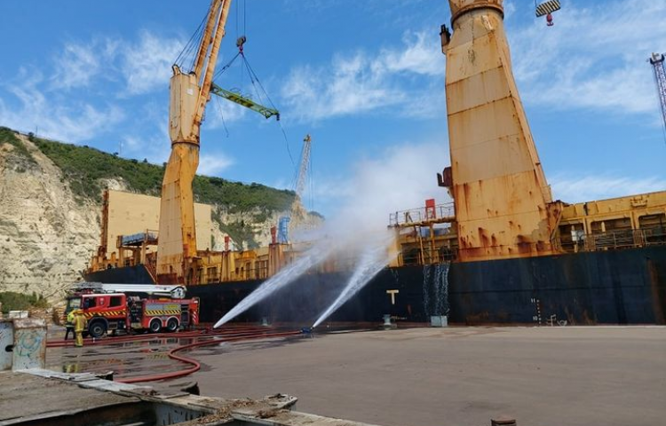 Firefighters to open hold of damaged ship at Napier Port