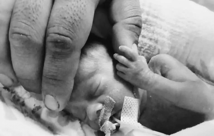 “He continues to fight with such strength,” says mother of baby born at 24 weeks gestation