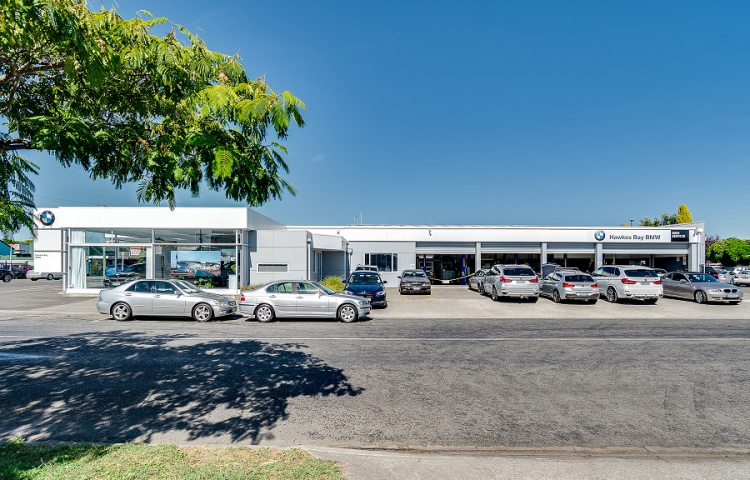 Luxury car yard for sale has potential buyers revved up