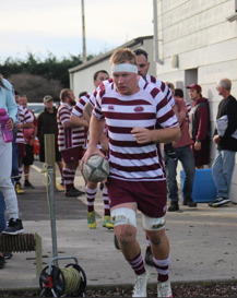 Red's rugby brace in 200th outing